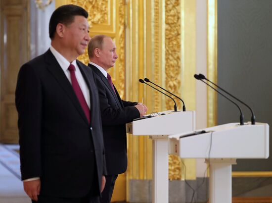 Vladimir Putin meets with Xi Jinping in Moscow