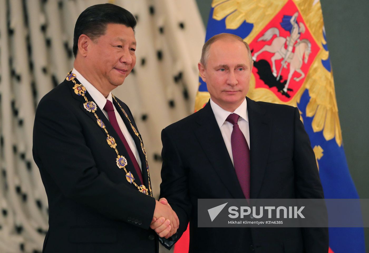 Vladimir Putin meets with Xi Jinping in Moscow