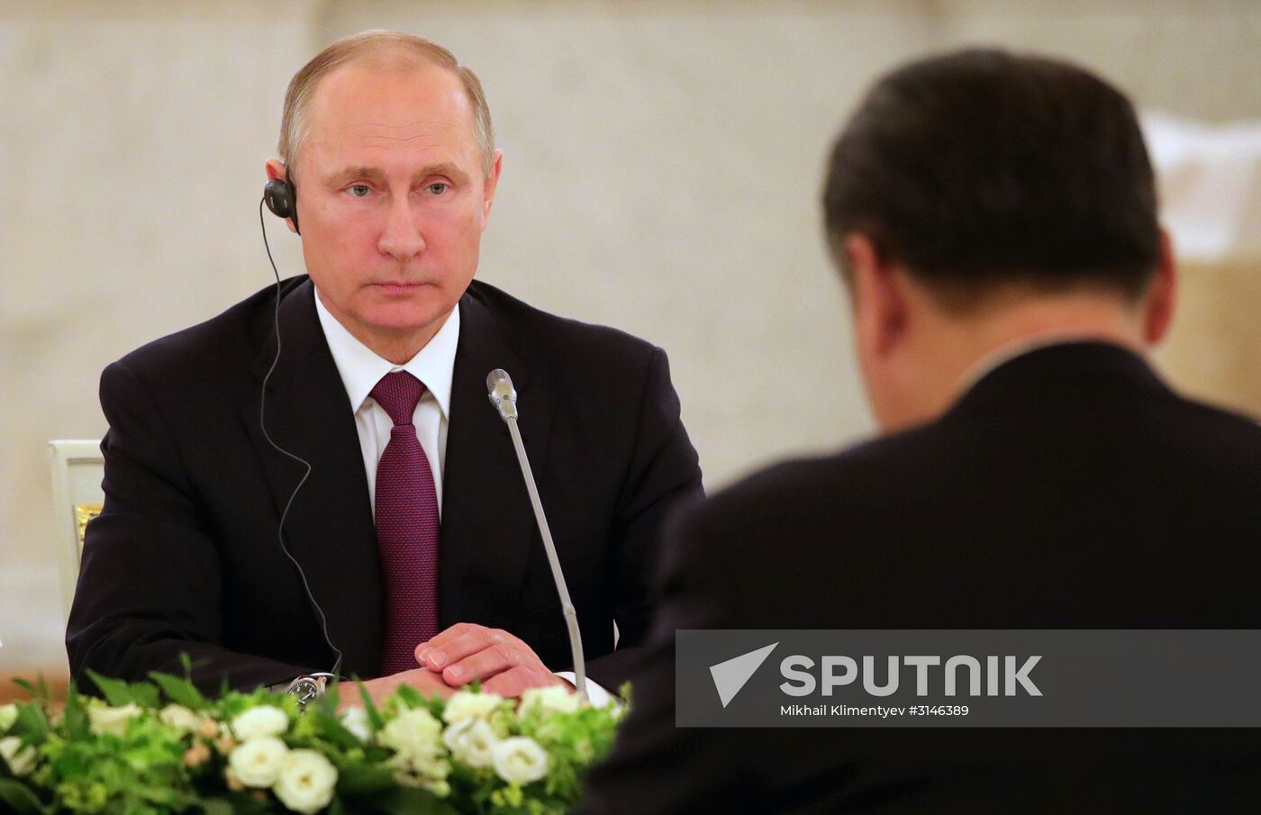 Russian President Vladimir Putin meets with Xi Jinping in Moscow