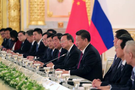 Vladimir Putin meets with Xi Jinping in Moscow
