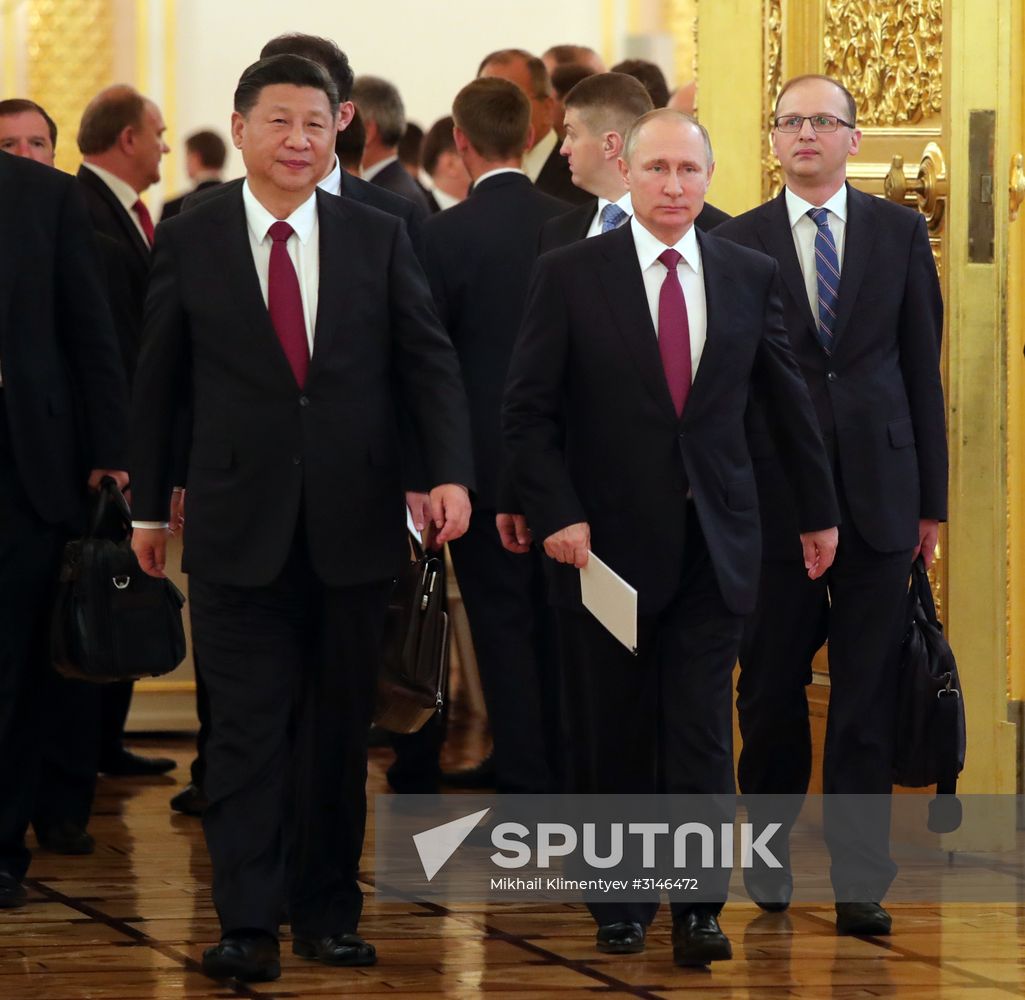 Vladimir Putin meets with Xi Jinping in Moscow