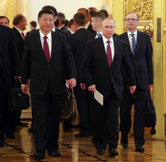 Vladimir Putin meets with Xi Jinping in Moscow