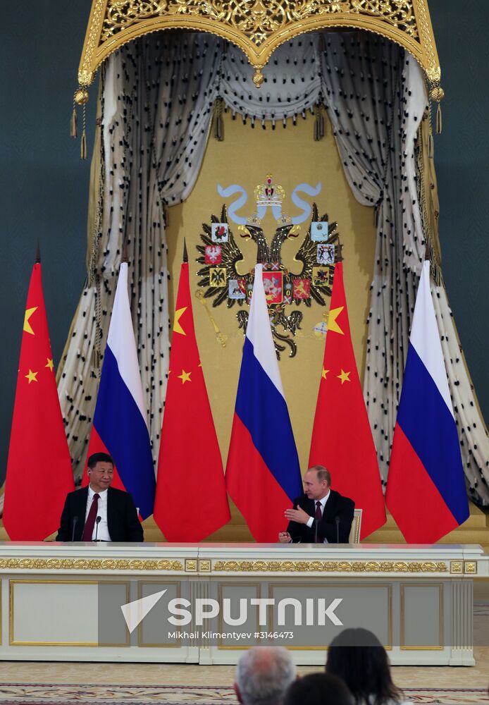 Vladimir Putin meets with Xi Jinping in Moscow