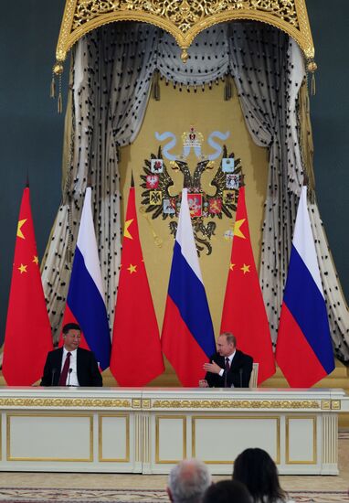 Vladimir Putin meets with Xi Jinping in Moscow