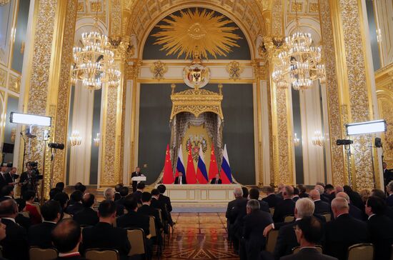 Vladimir Putin meets with Xi Jinping in Moscow