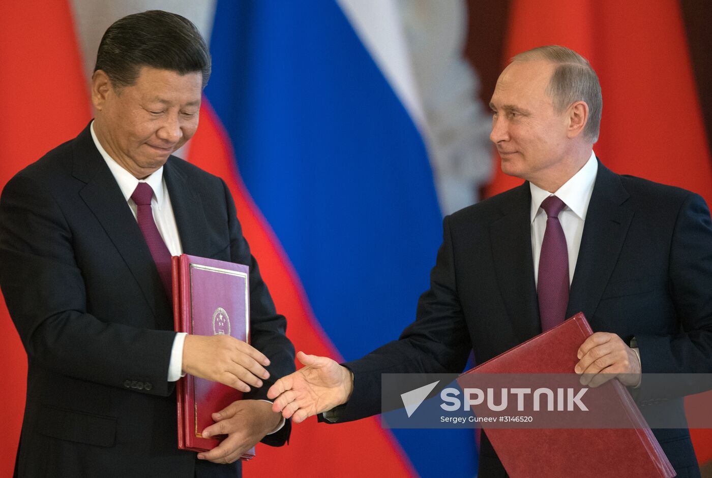 Vladimir Putin meets with Xi Jinping in Moscow