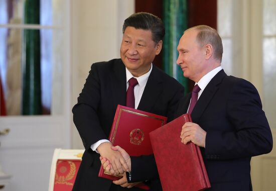 Vladimir Putin meets with Xi Jinping in Moscow