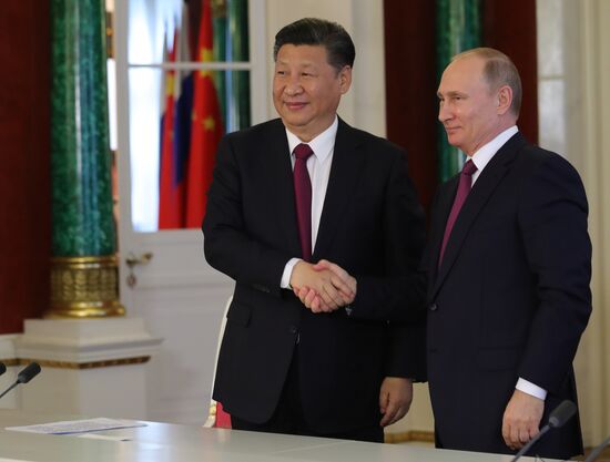 Vladimir Putin meets with Xi Jinping in Moscow