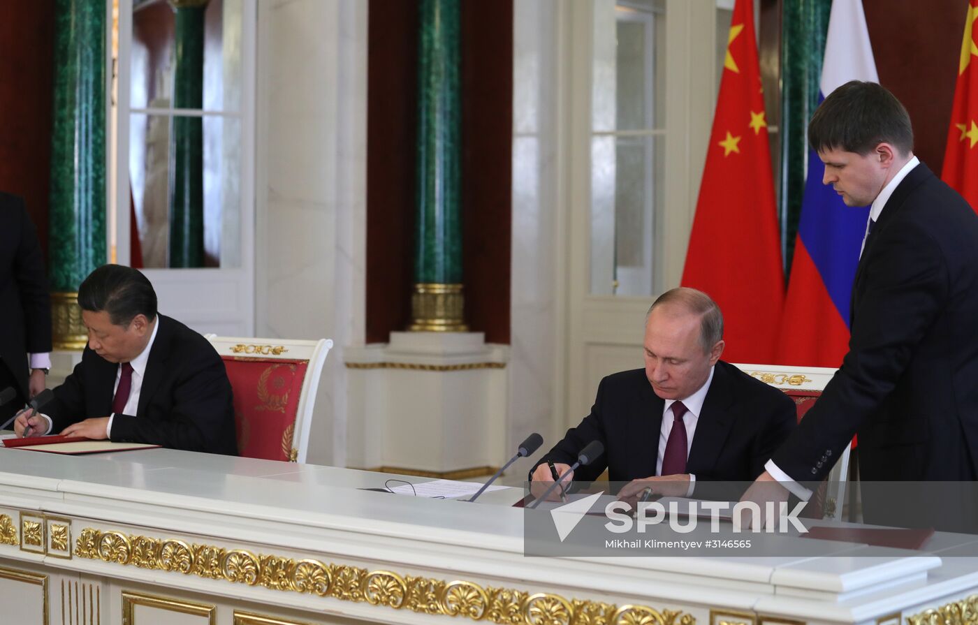 Vladimir Putin meets with Xi Jinping in Moscow