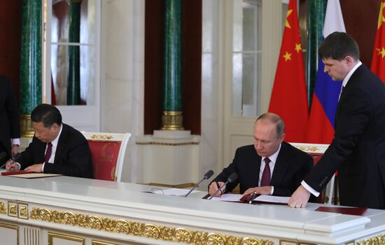 Vladimir Putin meets with Xi Jinping in Moscow