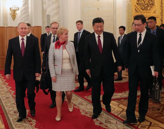 Vladimir Putin meets with Xi Jinping in Moscow