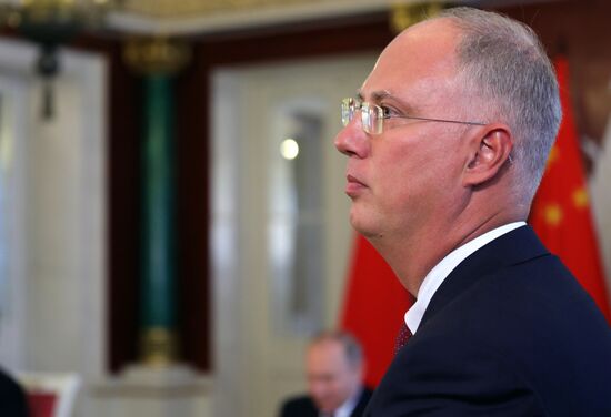 Vladimir Putin meets with Xi Jinping in Moscow