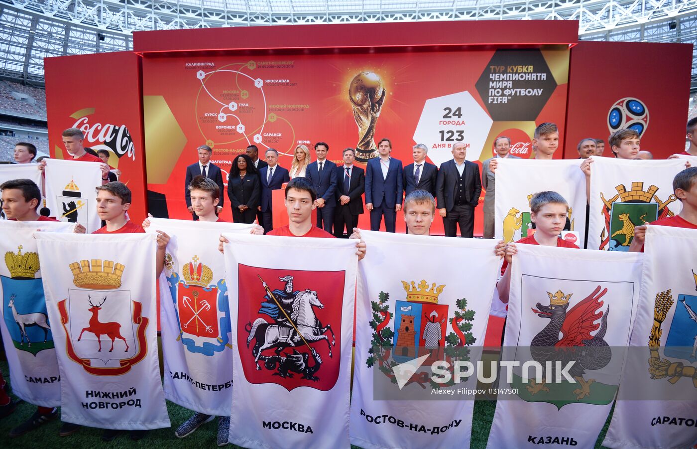 Volunteers demonstrate the emblems of 2018 FIFA World Cup participant cities during the ceremony of announcing 2018 FIFA World Cup route in Moscow. Location: Russia, Moscow. Author: Alexey Filippov/Sputnik. Ceremony of announcing 2018 FIFA World Cup route