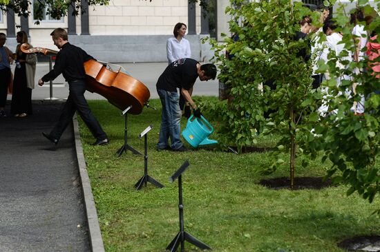 Planting the first tree in new theater alley near Novosibirsk Theater of Opera and Ballet