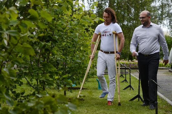 Planting the first tree in new theater alley near Novosibirsk Theater of Opera and Ballet