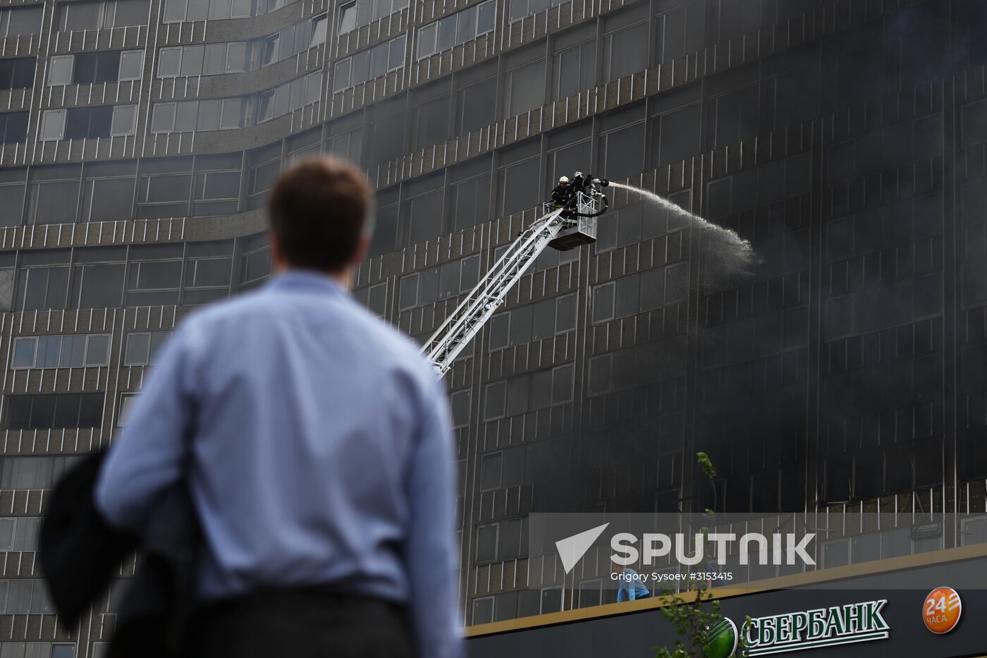 Fire sweeps skyscraper on Moscow's Novy Arbat Street