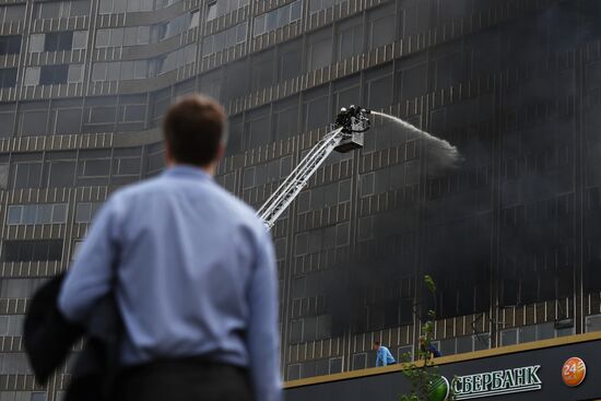 Fire sweeps skyscraper on Moscow's Novy Arbat Street