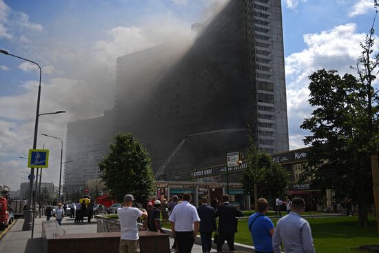 Fire sweeps skyscraper on Moscow's Novy Arbat Street