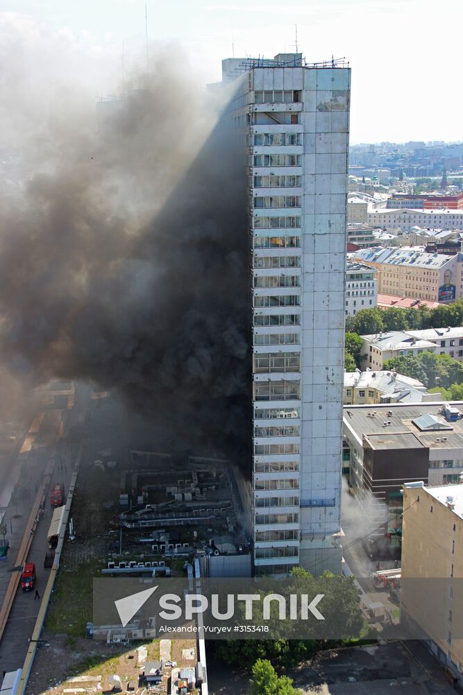 Fire sweeps skyscraper on Moscow's Novy Arbat Street