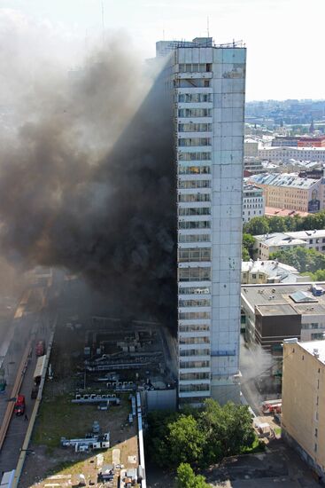Fire sweeps skyscraper on Moscow's Novy Arbat Street