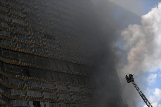Fire sweeps skyscraper on Moscow's Novy Arbat Street