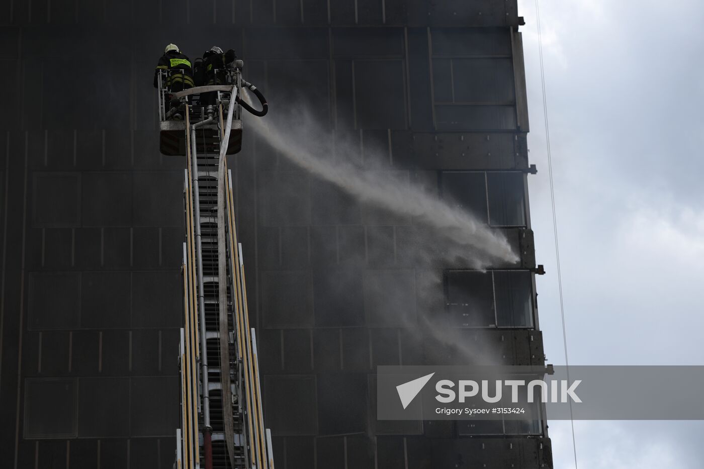Fire sweeps skyscraper on Moscow's Novy Arbat Street
