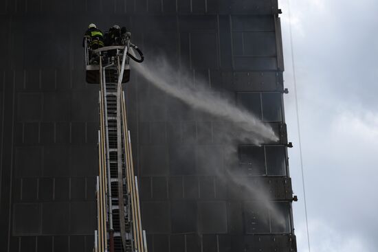 Fire sweeps skyscraper on Moscow's Novy Arbat Street