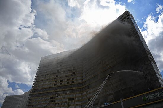 Fire sweeps skyscraper on Moscow's Novy Arbat Street