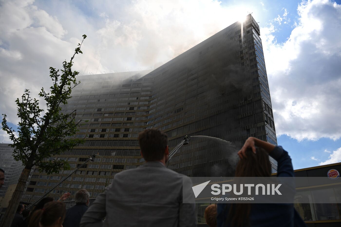Fire sweeps skyscraper on Moscow's Novy Arbat Street