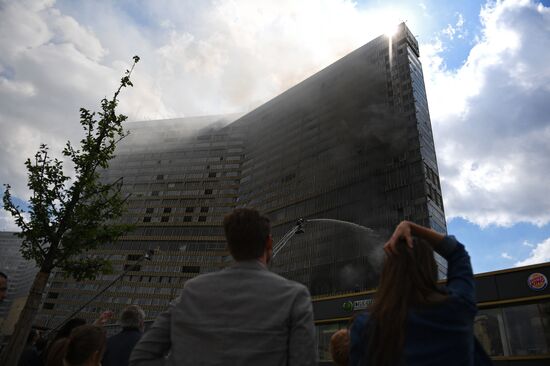 Fire sweeps skyscraper on Moscow's Novy Arbat Street