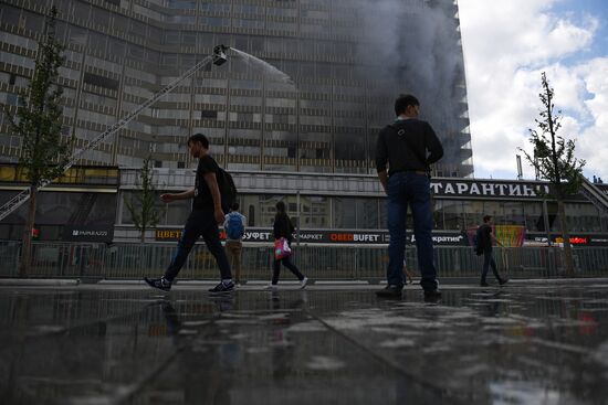 Fire sweeps skyscraper on Moscow's Novy Arbat Street