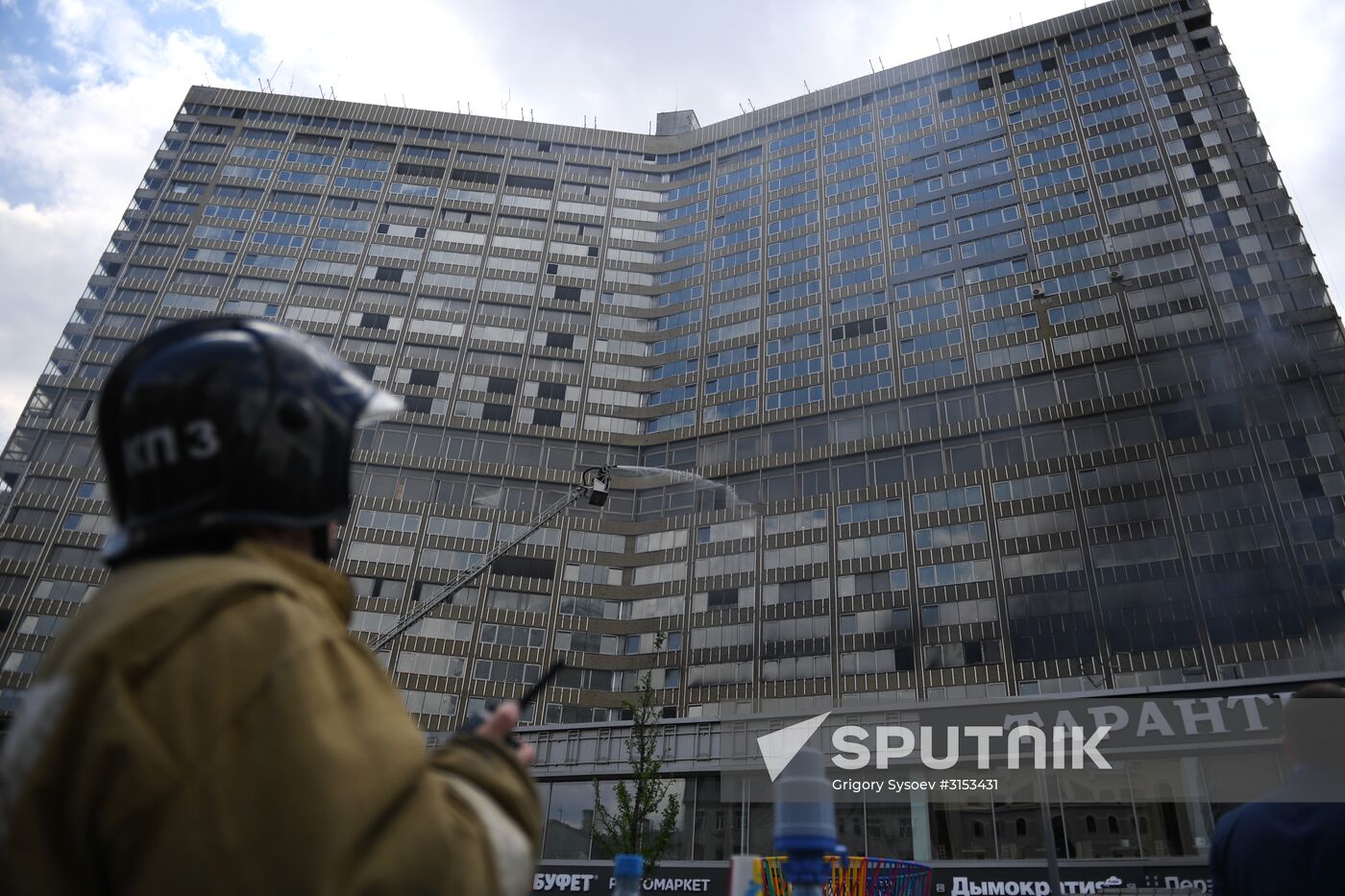 Fire sweeps skyscraper on Moscow's Novy Arbat Street