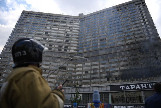 Fire sweeps skyscraper on Moscow's Novy Arbat Street