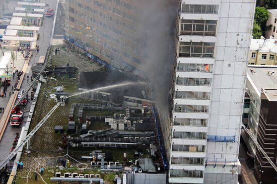Fire sweeps skyscraper on Moscow's Novy Arbat Street