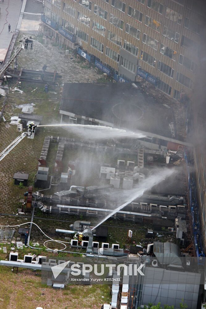 Fire sweeps skyscraper on Moscow's Novy Arbat Street