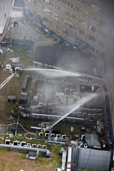 Fire sweeps skyscraper on Moscow's Novy Arbat Street