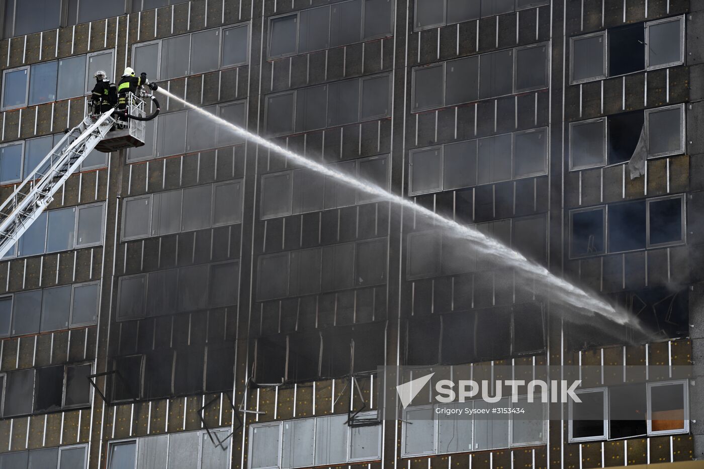 Fire sweeps skyscraper on Moscow's Novy Arbat Street