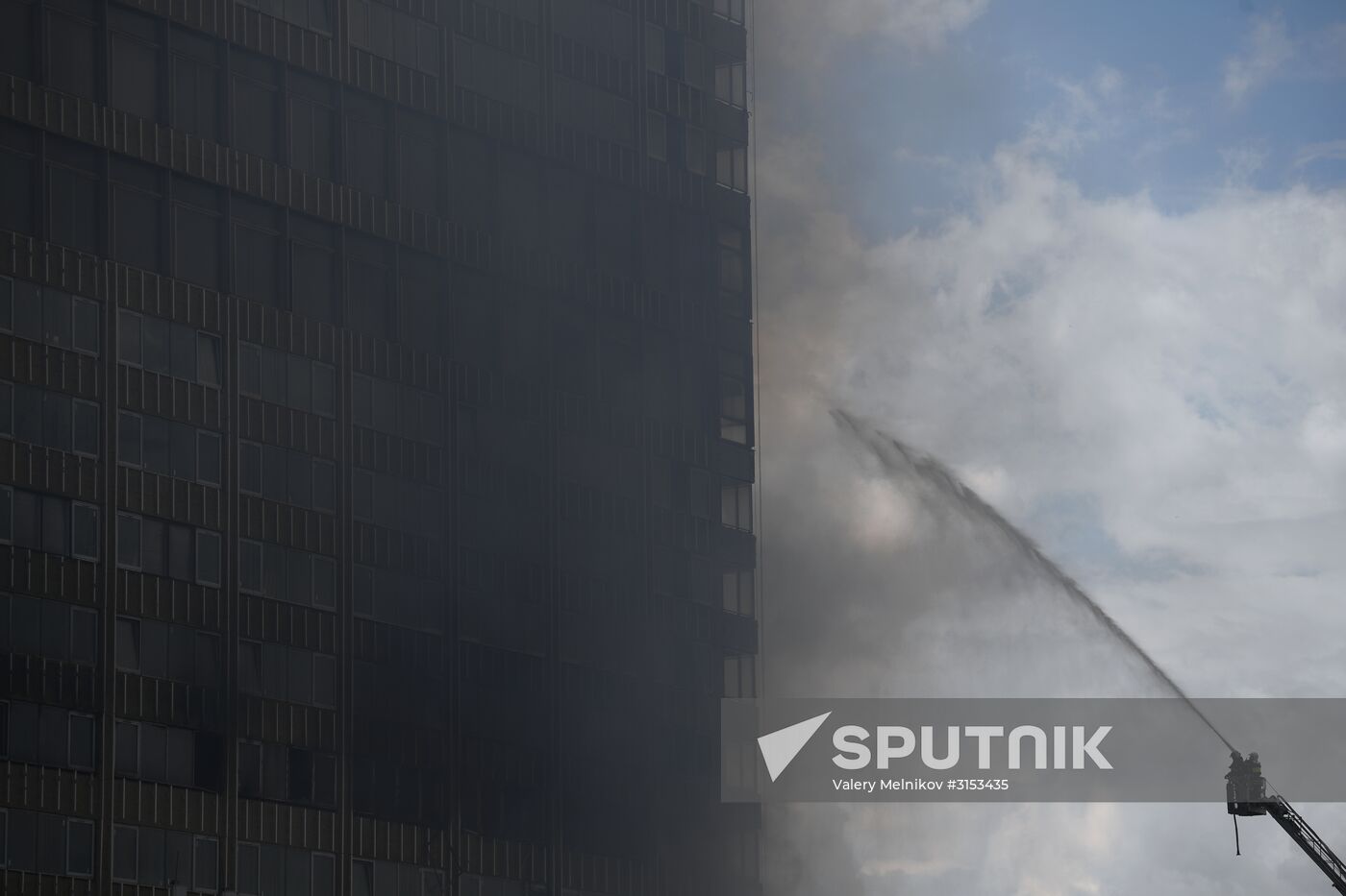 Fire sweeps skyscraper on Moscow's Novy Arbat Street