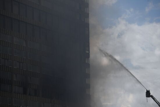 Fire sweeps skyscraper on Moscow's Novy Arbat Street