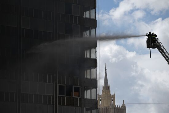 Fire sweeps skyscraper on Moscow's Novy Arbat Street