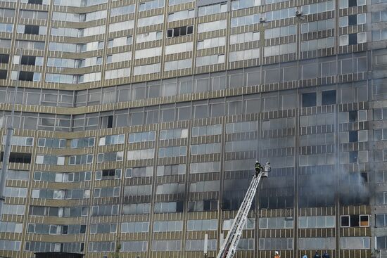 Fire sweeps skyscraper on Moscow's Novy Arbat Street