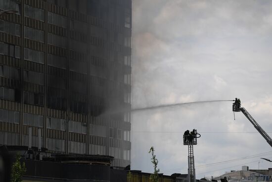Fire sweeps skyscraper on Moscow's Novy Arbat Street