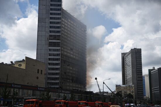 Fire sweeps skyscraper on Moscow's Novy Arbat Street