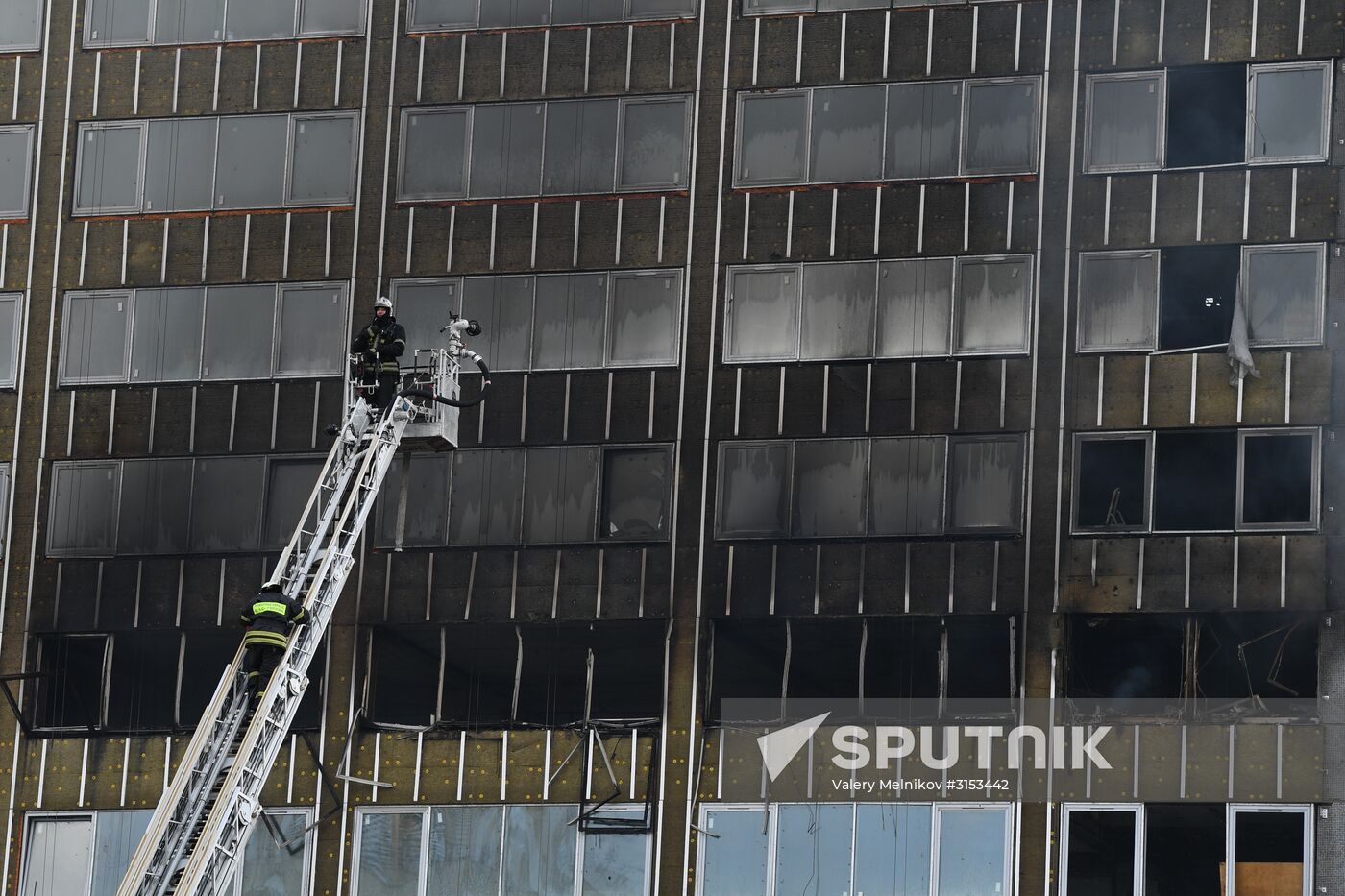 Fire sweeps skyscraper on Moscow's Novy Arbat Street