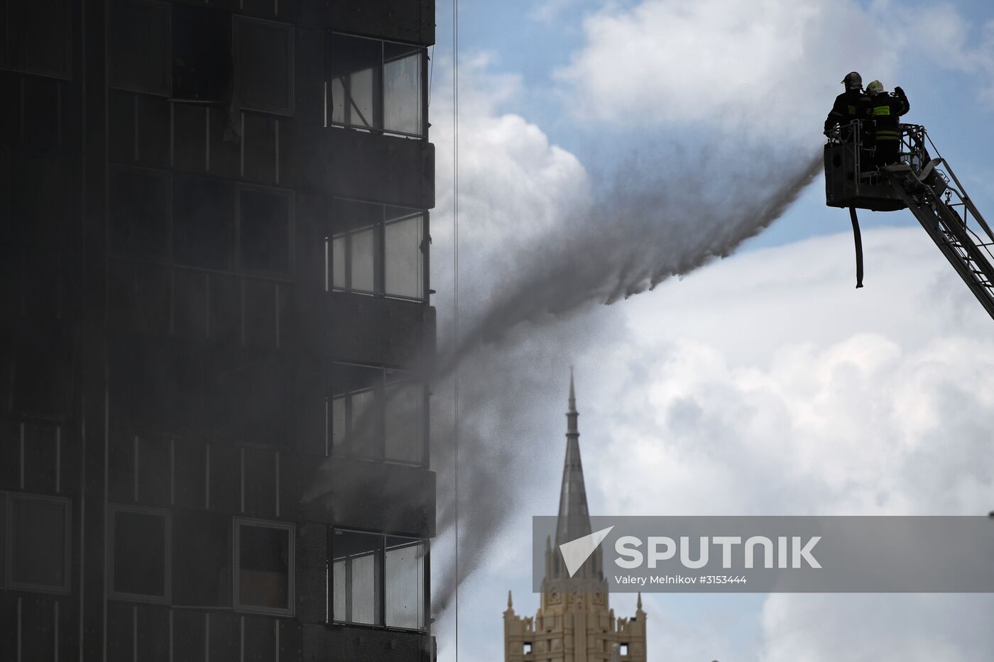 Fire sweeps skyscraper on Moscow's Novy Arbat Street