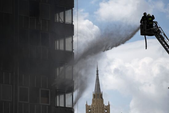 Fire sweeps skyscraper on Moscow's Novy Arbat Street