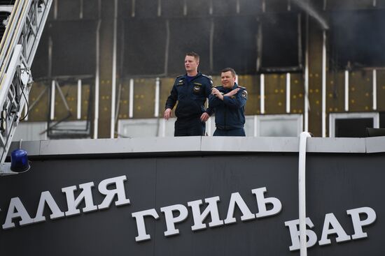 Fire sweeps skyscraper on Moscow's Novy Arbat Street