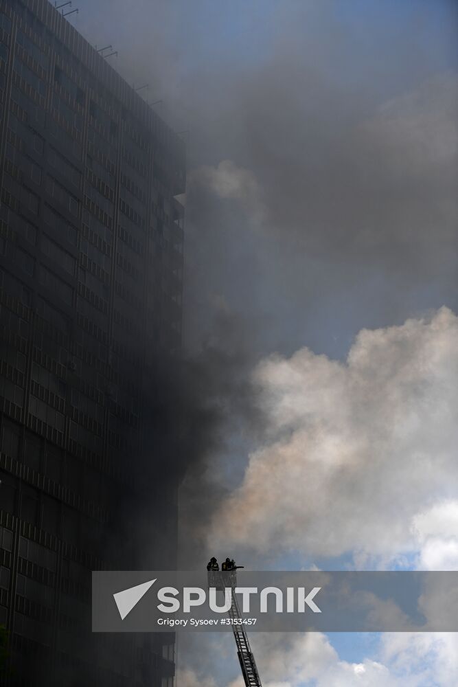 Fire sweeps skyscraper on Moscow's Novy Arbat Street