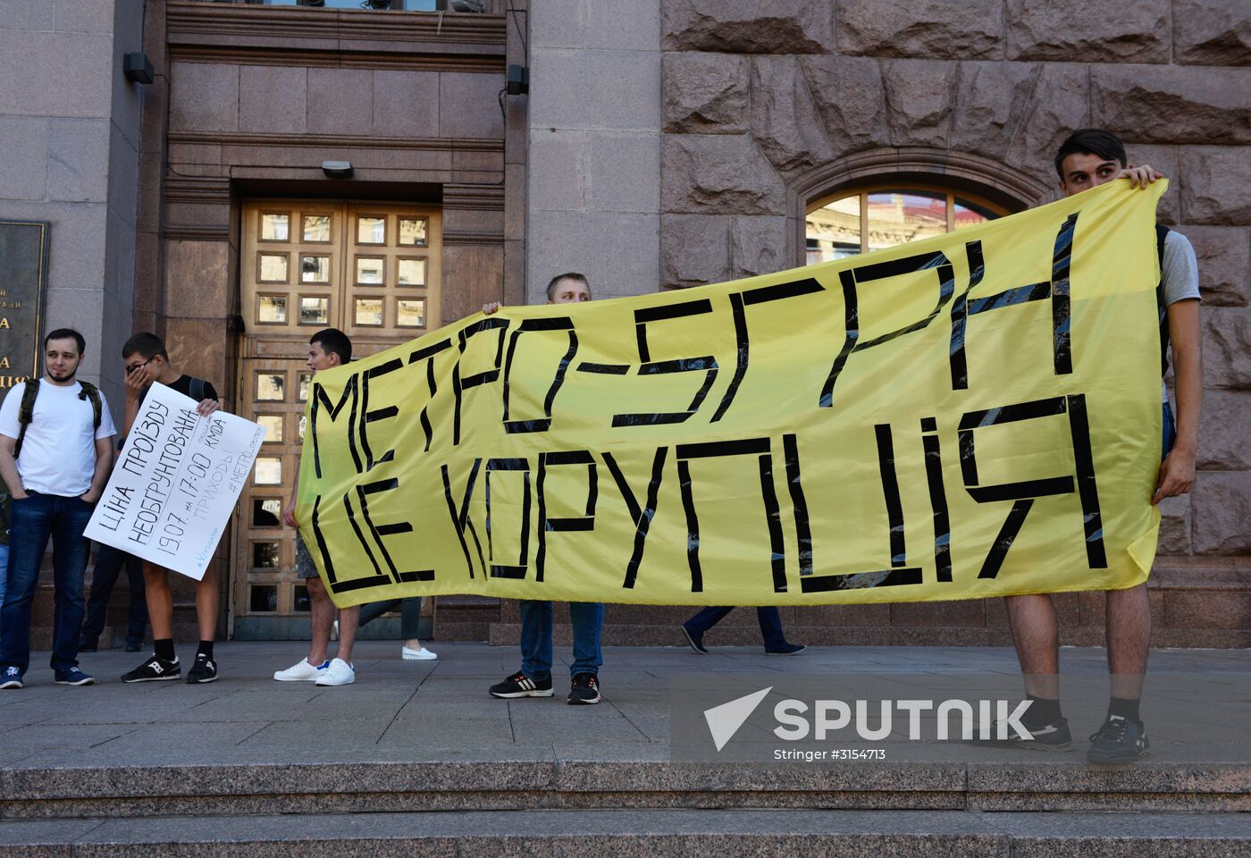 Rally against protests metro fare rise in Kiev