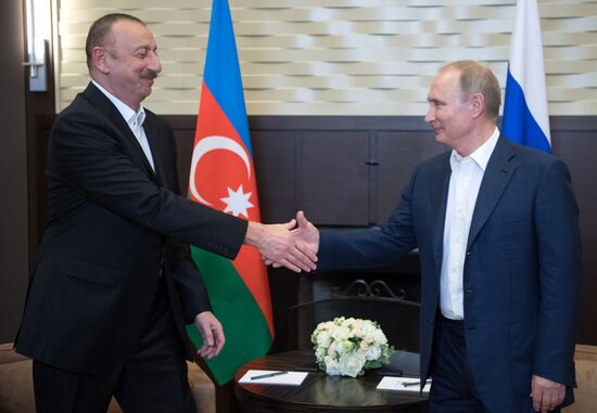 Russian President Vladimir Putin meets with President of Azerbaijan Ilham Aliyev